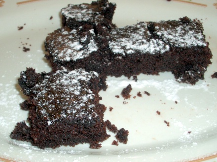 Dark colored cake, by John Holly